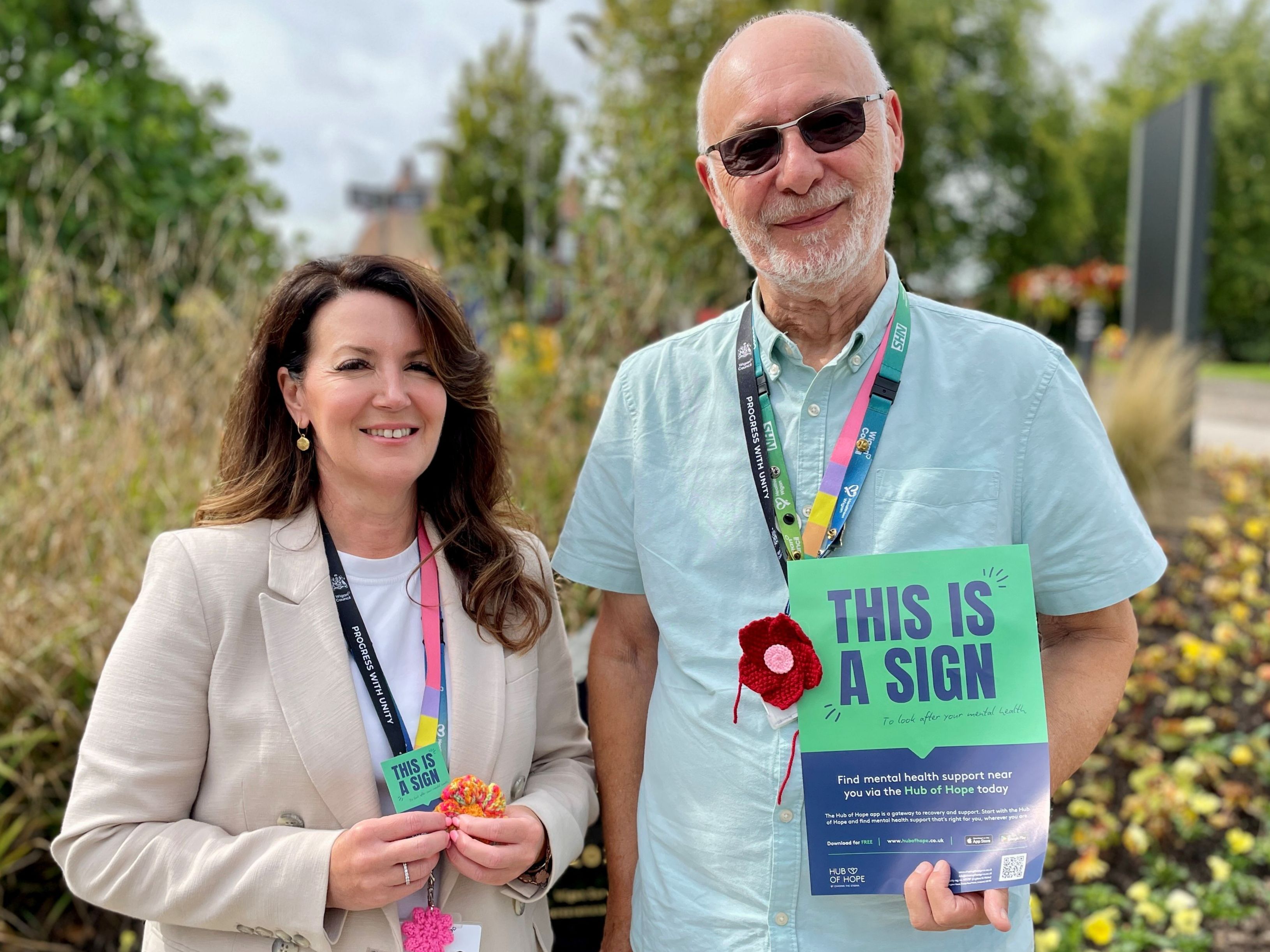 Councillor Keith Cunliffe and director of public health Rachael Musgrave with the Flowers of Hope Councillor Keith Cunliffe and director of public health Rachael Musgrave with the Flowers of Hope